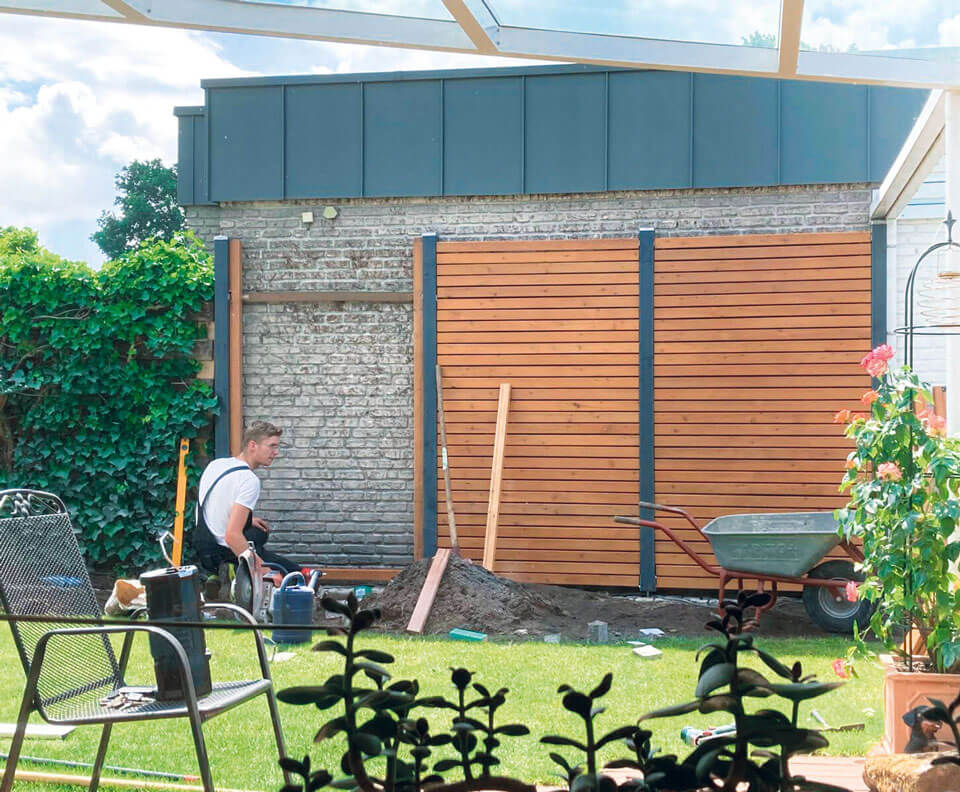 Holzbau im Garten in Warendorf mit Sichtschutzwänden, Pergolen, Hochbeeten und individuellen Gartenkonstruktionen